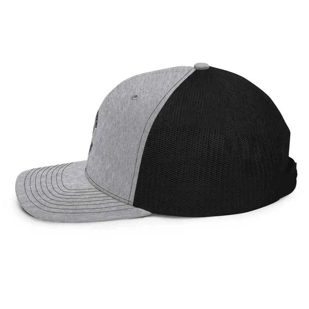 Side view of the Disciple Trucker Cap religious showcasing its stylish design and quality materials.