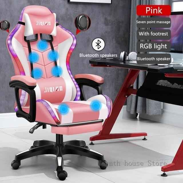 High quality gaming chair RGB light office chair with Bluetooth speakers and footrest in pink color.